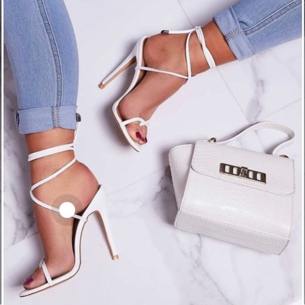 Ego Rochelle lace up heels in white.